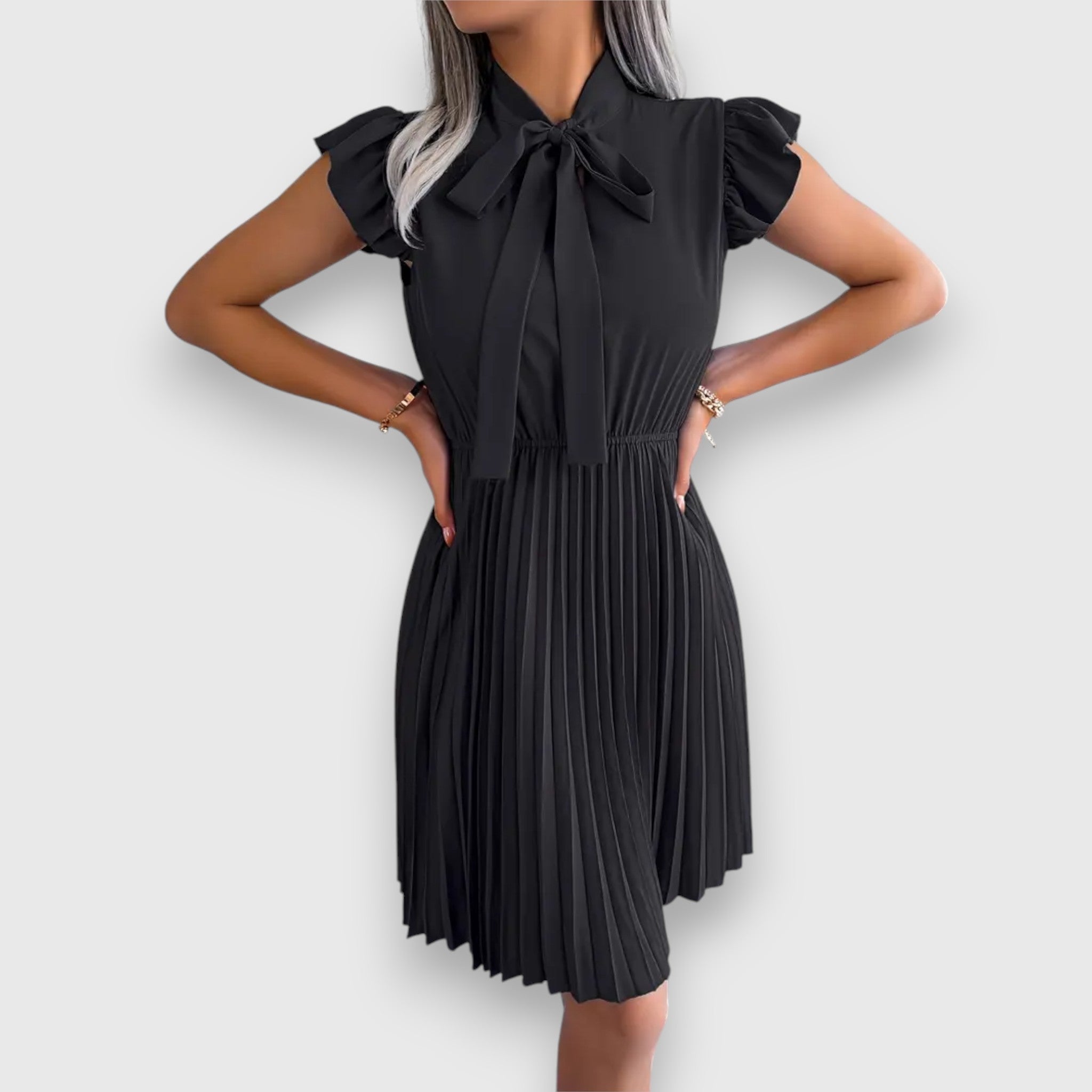 Nivara – Pleated Dress with a Feminine Touch