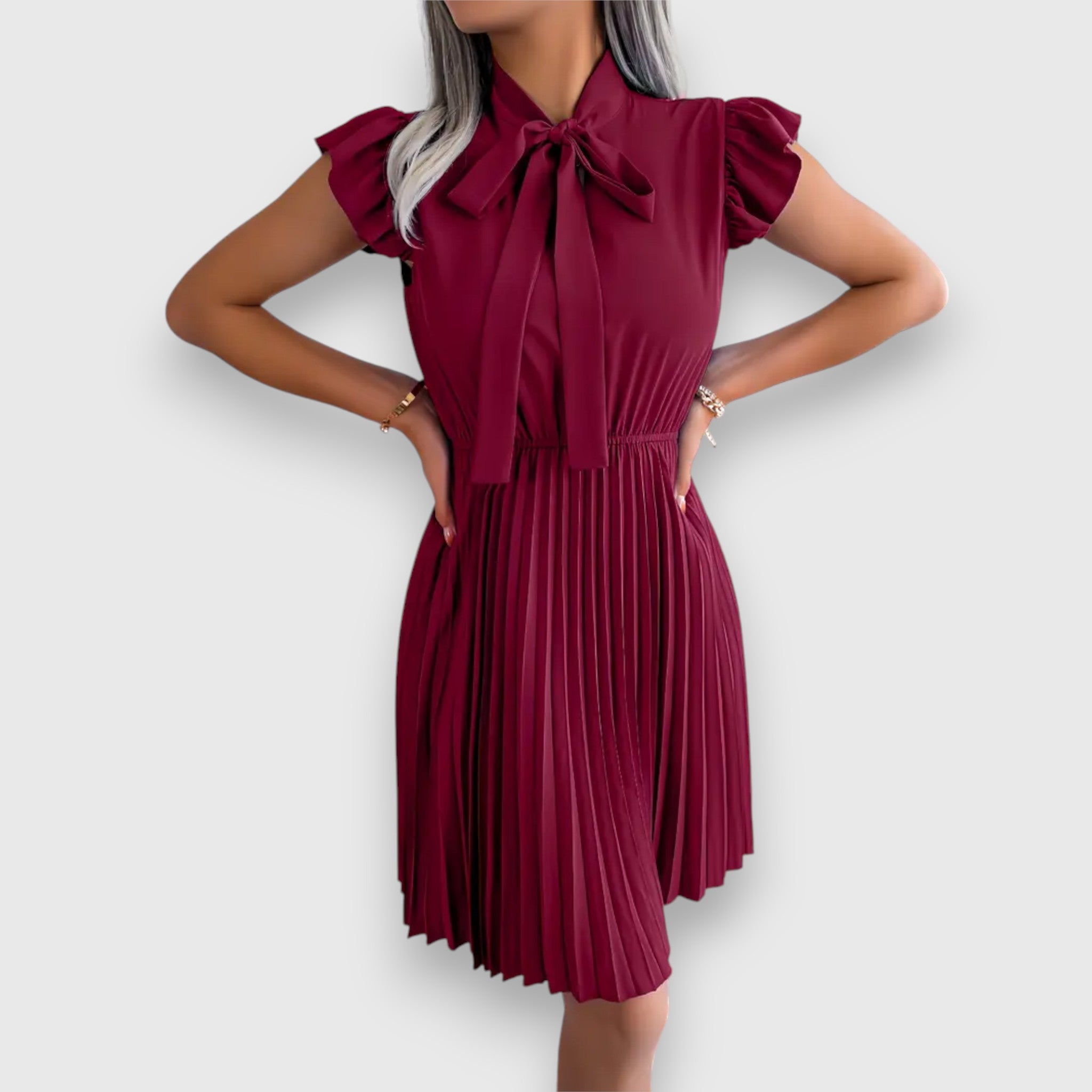 Nivara – Pleated Dress with a Feminine Touch