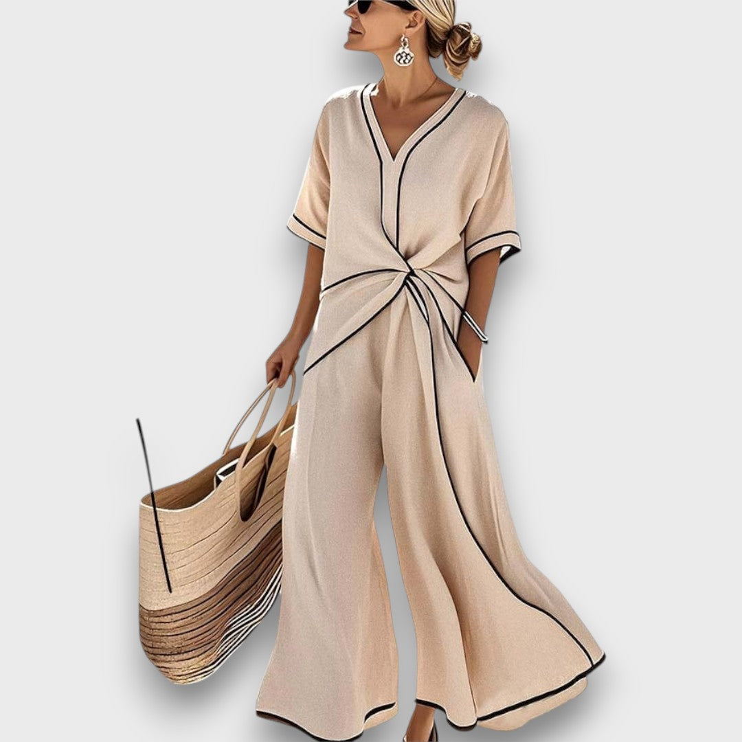 Marcellia – Elegant Jumpsuit with Contrast Piping