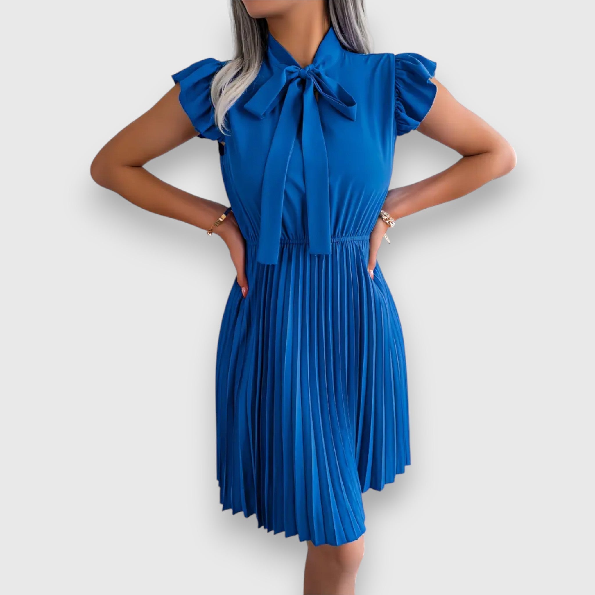 Nivara – Pleated Dress with a Feminine Touch