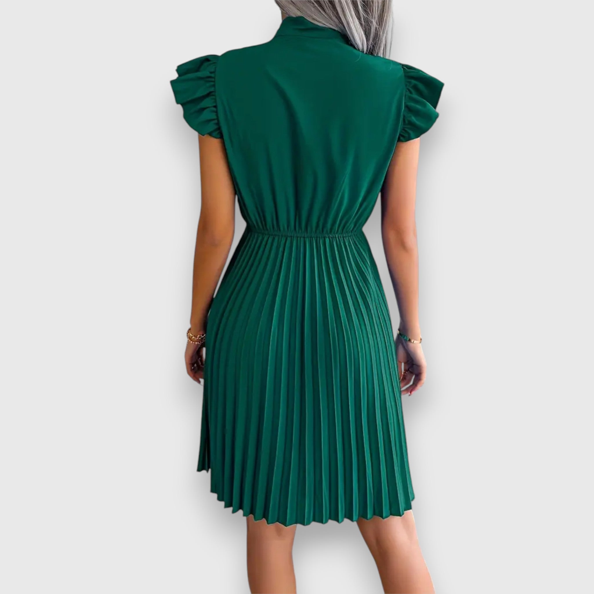 Nivara – Pleated Dress with a Feminine Touch